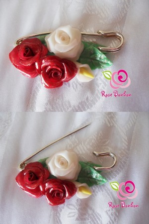 Broche rosas rojas